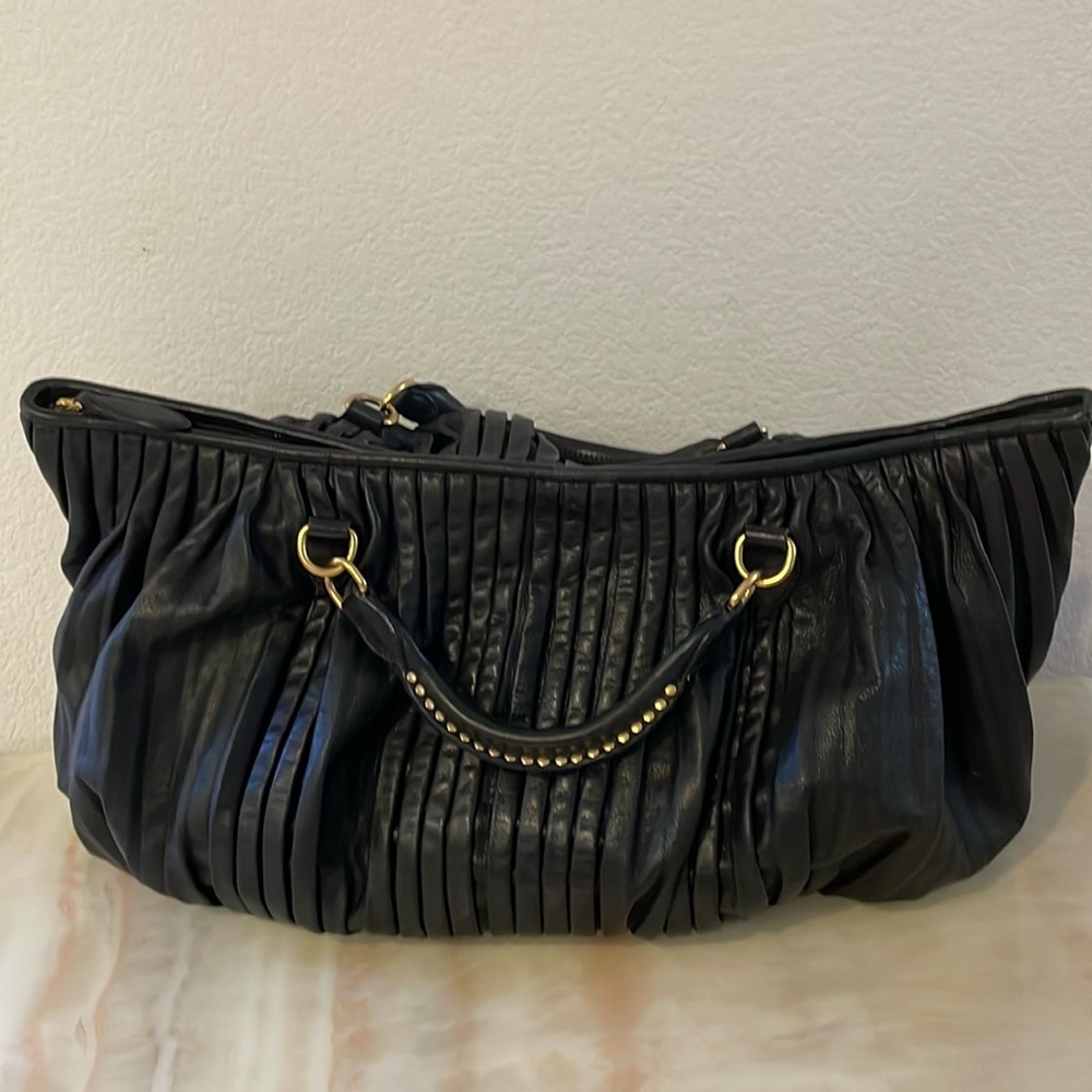 Miu Miu Black Travel Bag with Gold Accents